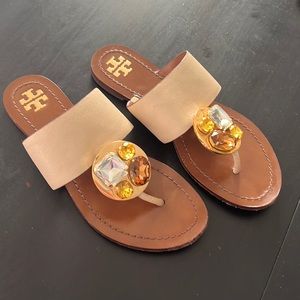 Tory Burch sandal in nude with jewel accent.